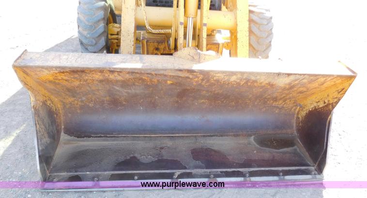 image for item AW9332 2000 John Deere 310SE backhoe