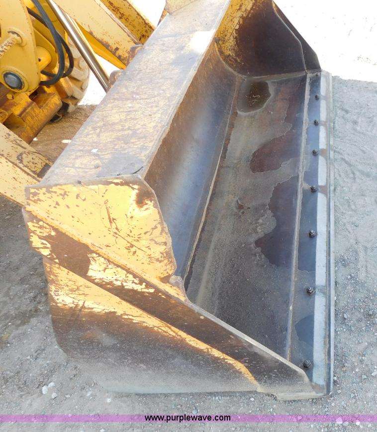 image for item AW9332 2000 John Deere 310SE backhoe