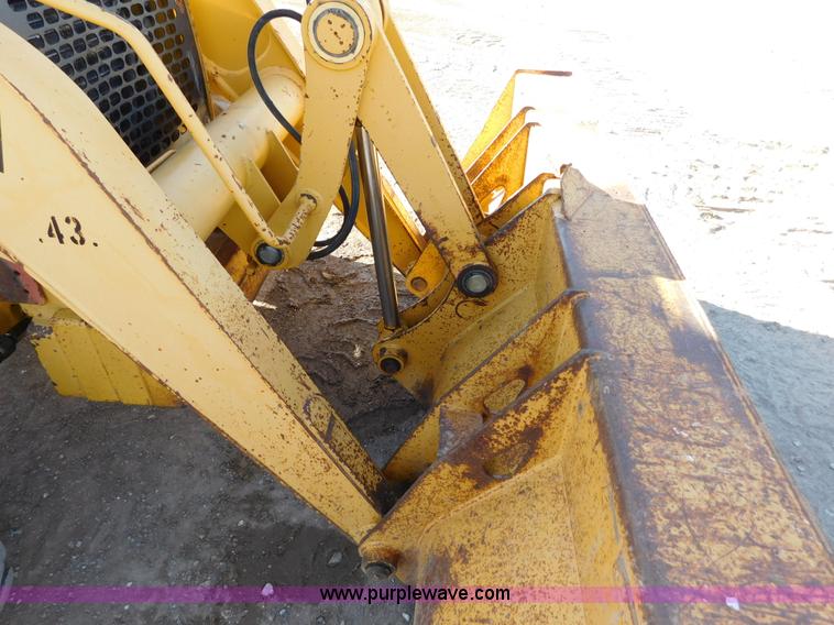 image for item AW9332 2000 John Deere 310SE backhoe