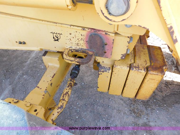 image for item AW9332 2000 John Deere 310SE backhoe