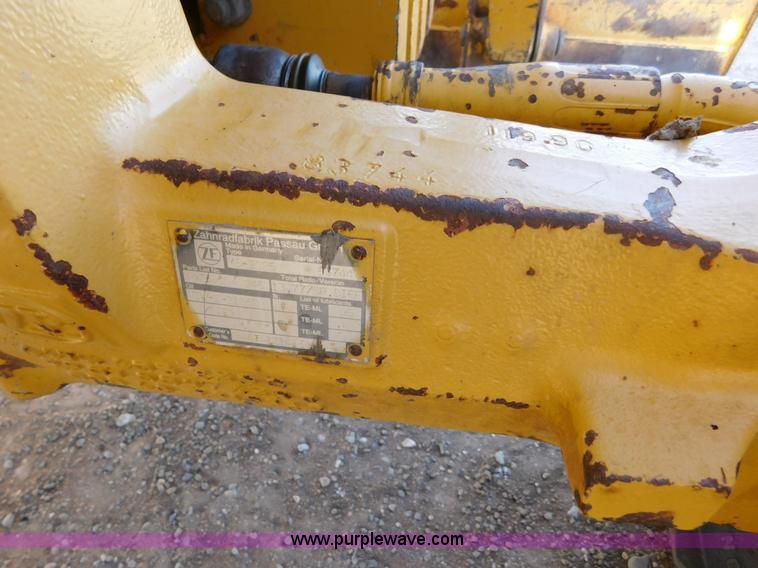 image for item AW9332 2000 John Deere 310SE backhoe