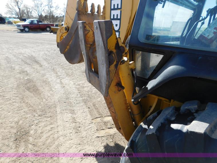 image for item AW9332 2000 John Deere 310SE backhoe