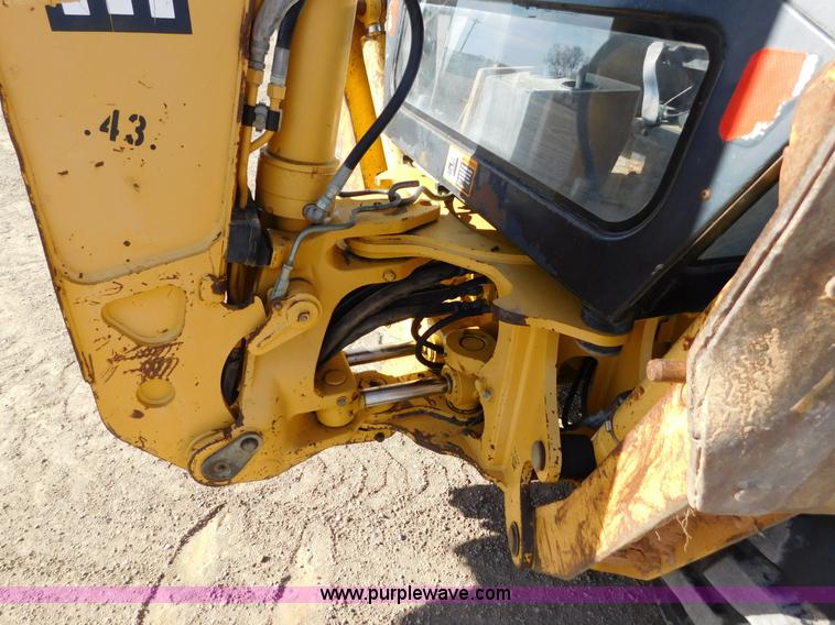 image for item AW9332 2000 John Deere 310SE backhoe