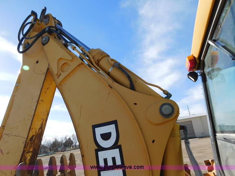 image for item AW9332 2000 John Deere 310SE backhoe
