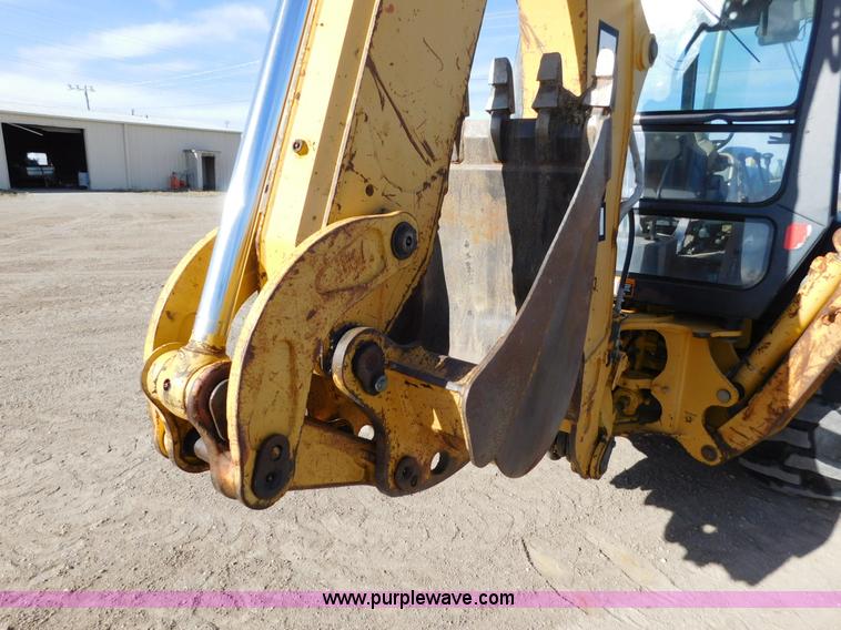 image for item AW9332 2000 John Deere 310SE backhoe