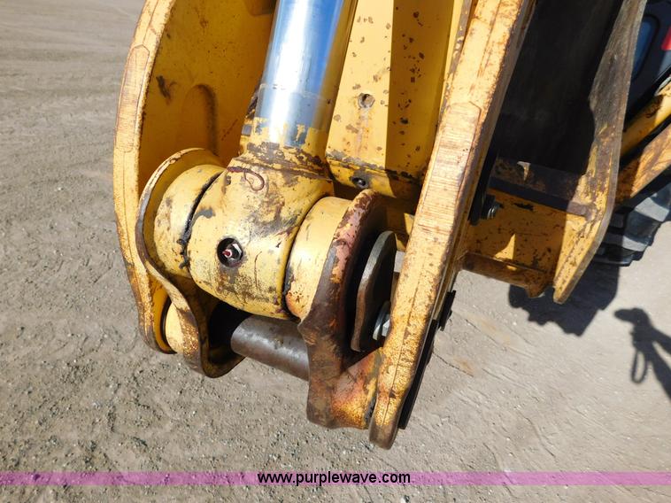 image for item AW9332 2000 John Deere 310SE backhoe