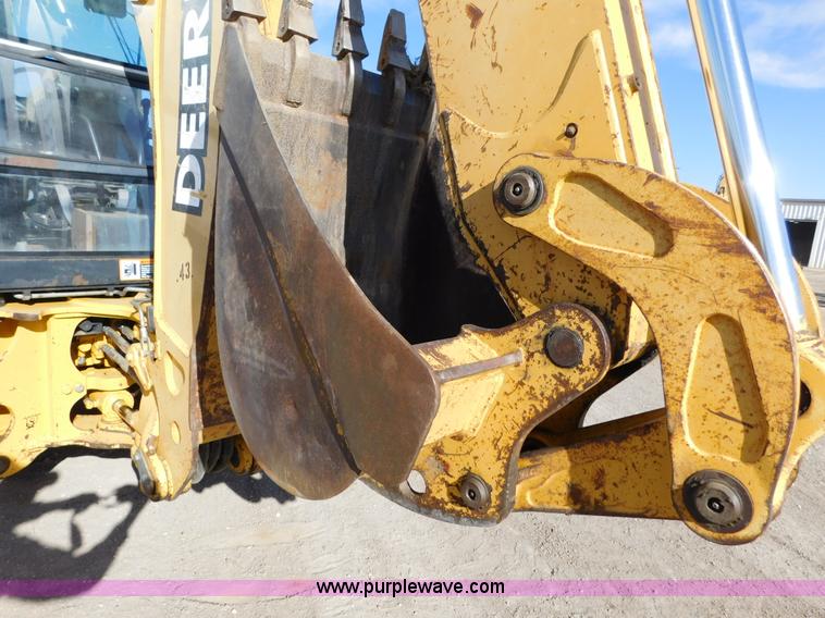 image for item AW9332 2000 John Deere 310SE backhoe