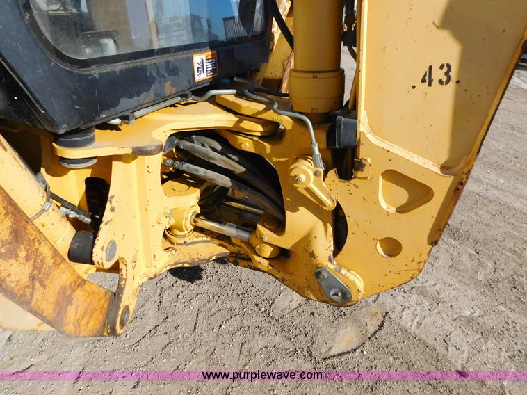 image for item AW9332 2000 John Deere 310SE backhoe