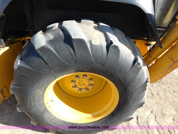 image for item AW9332 2000 John Deere 310SE backhoe