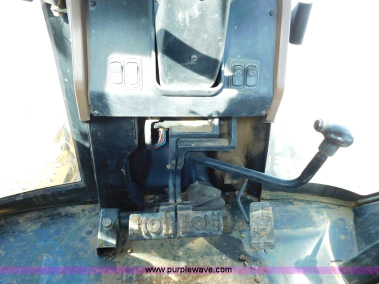 image for item AW9332 2000 John Deere 310SE backhoe