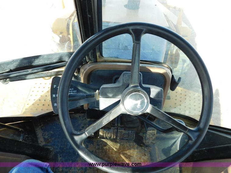 image for item AW9332 2000 John Deere 310SE backhoe