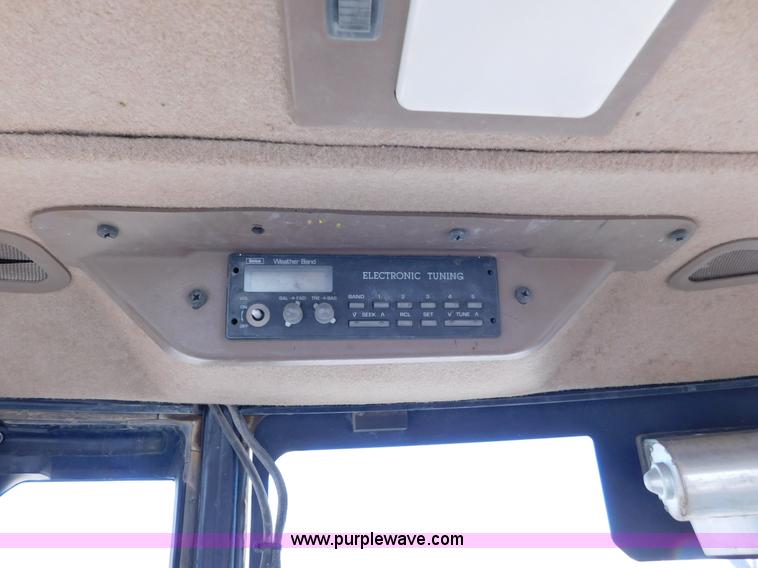 image for item AW9332 2000 John Deere 310SE backhoe