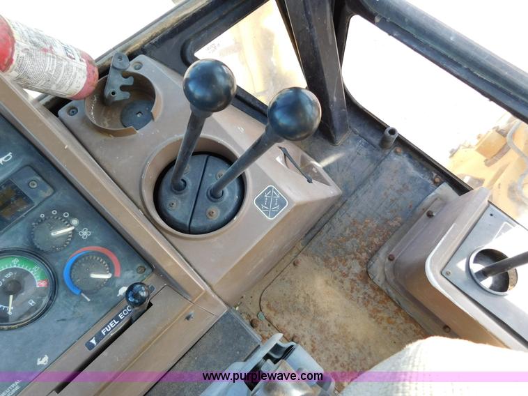 image for item AW9332 2000 John Deere 310SE backhoe