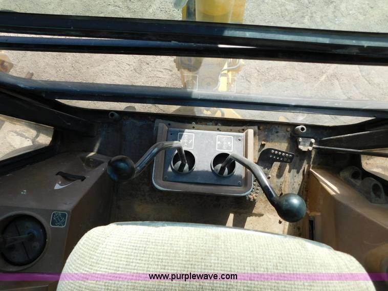 image for item AW9332 2000 John Deere 310SE backhoe