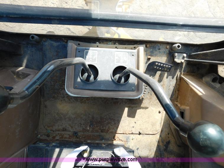 image for item AW9332 2000 John Deere 310SE backhoe