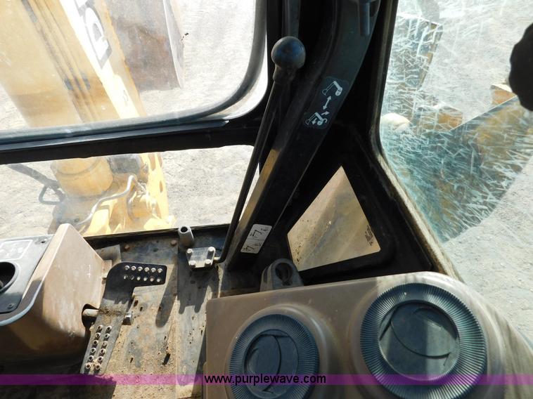 image for item AW9332 2000 John Deere 310SE backhoe