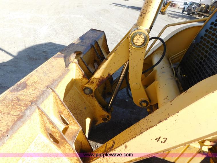 image for item AW9332 2000 John Deere 310SE backhoe