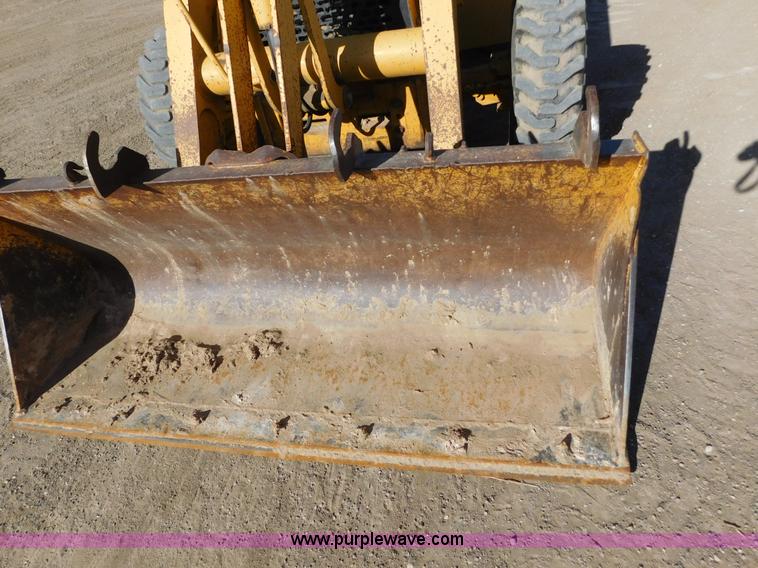 image for item AW9333 1997 John Deere 310SE backhoe