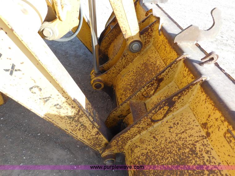 image for item AW9333 1997 John Deere 310SE backhoe