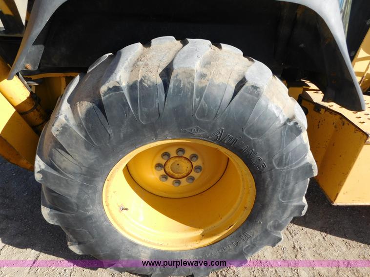 image for item AW9333 1997 John Deere 310SE backhoe