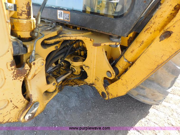 image for item AW9333 1997 John Deere 310SE backhoe
