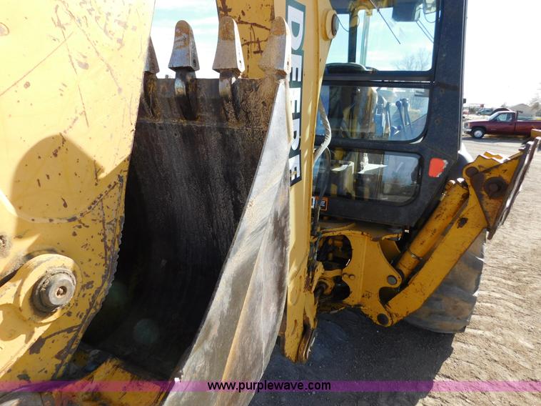 image for item AW9333 1997 John Deere 310SE backhoe