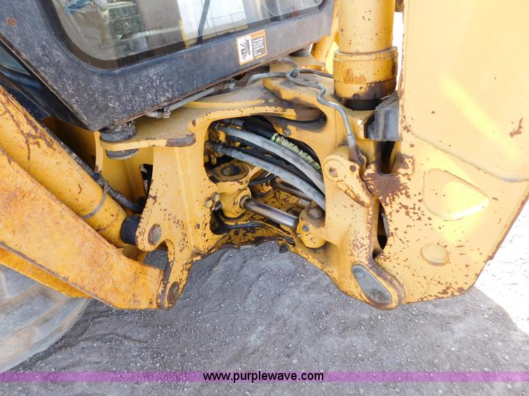 image for item AW9333 1997 John Deere 310SE backhoe