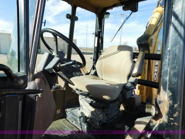 image for item AW9333 1997 John Deere 310SE backhoe