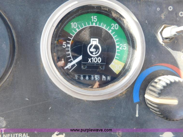 image for item AW9333 1997 John Deere 310SE backhoe