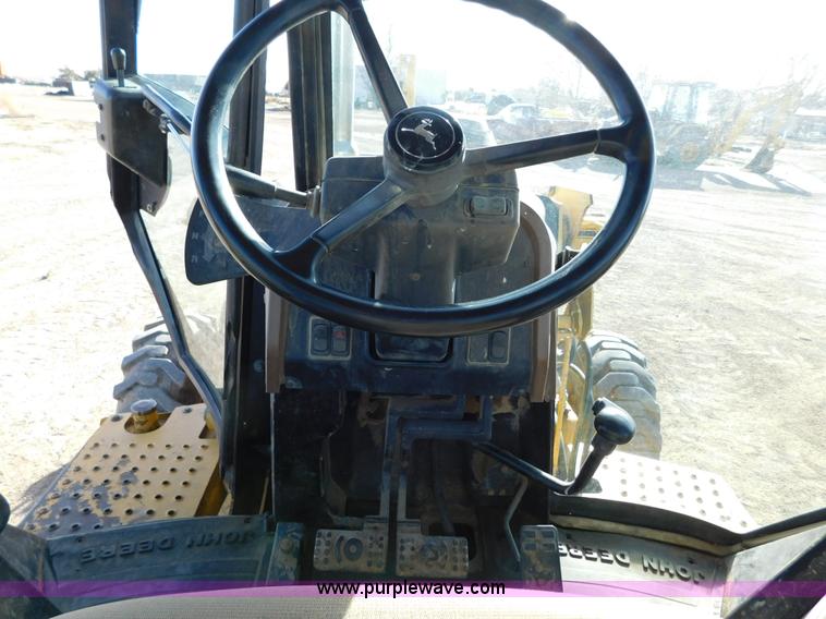 image for item AW9333 1997 John Deere 310SE backhoe