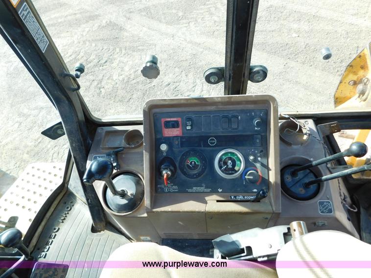 image for item AW9333 1997 John Deere 310SE backhoe