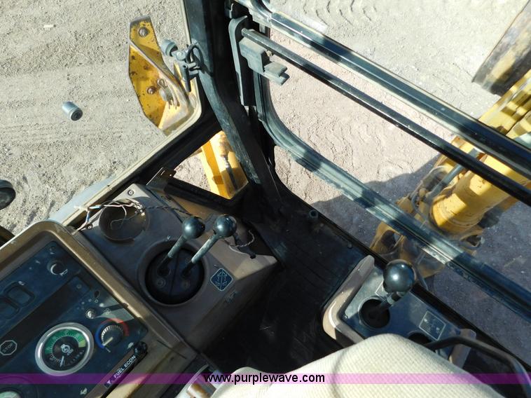 image for item AW9333 1997 John Deere 310SE backhoe