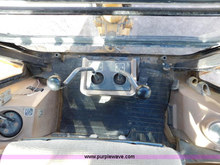 image for item AW9333 1997 John Deere 310SE backhoe