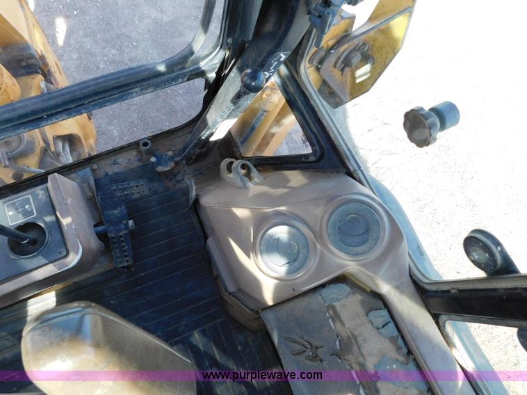 image for item AW9333 1997 John Deere 310SE backhoe