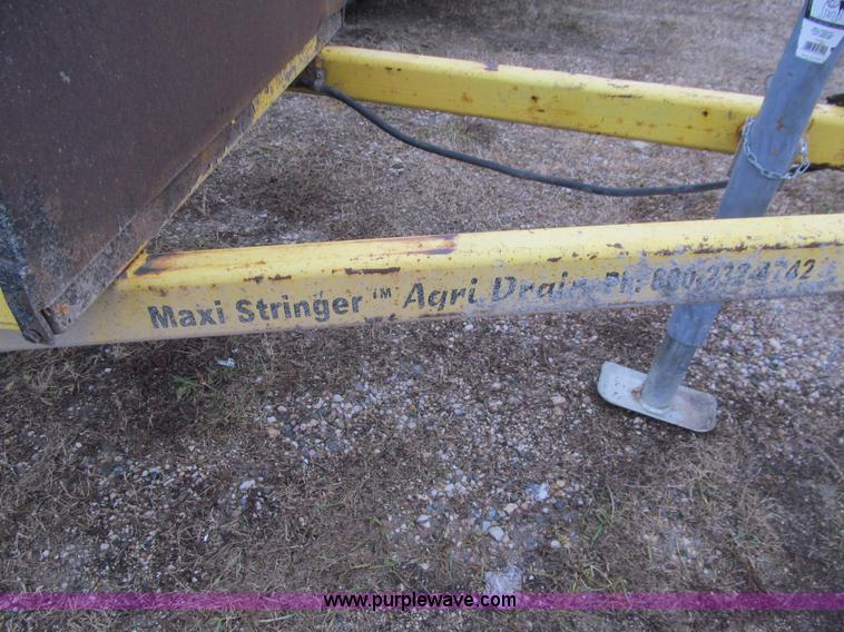 image for item L1979 2004 Agri Drain Maxi Series J stinger trailer