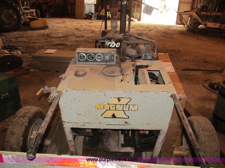 image for item L1988 Magnum PS6585-26 concrete saw