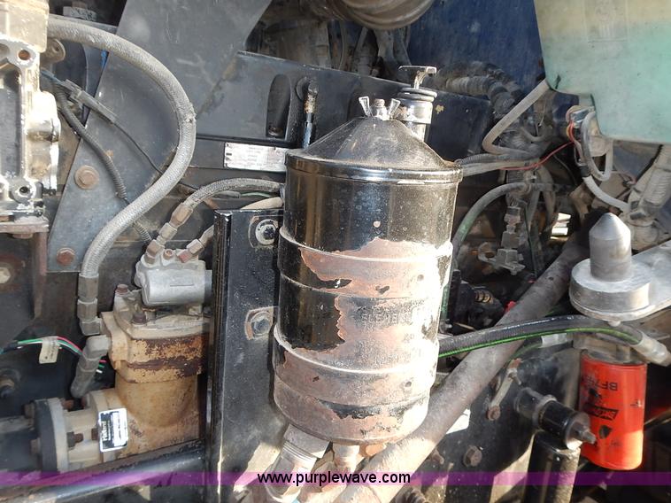 image for item L3604 1994 Kenworth T450B semi truck