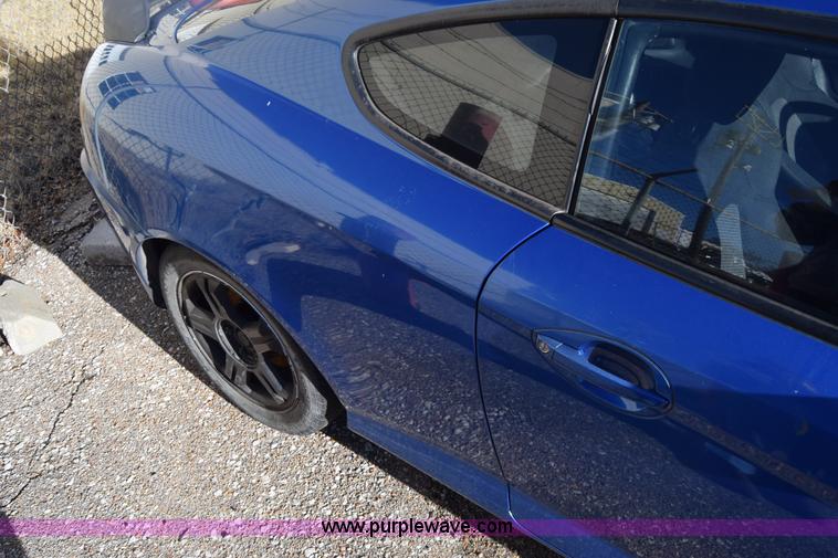 image for item L1017 2004 Hyundai Tiburon SUV