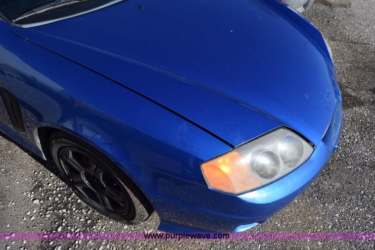 image for item L1017 2004 Hyundai Tiburon SUV