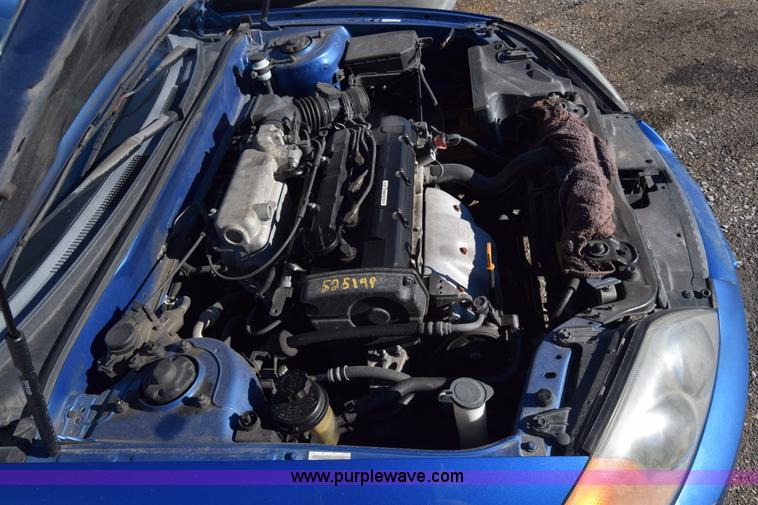 image for item L1017 2004 Hyundai Tiburon SUV