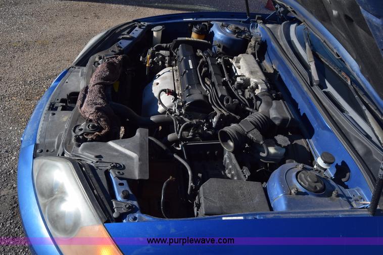 image for item L1017 2004 Hyundai Tiburon SUV