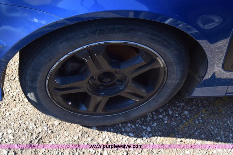 image for item L1017 2004 Hyundai Tiburon SUV