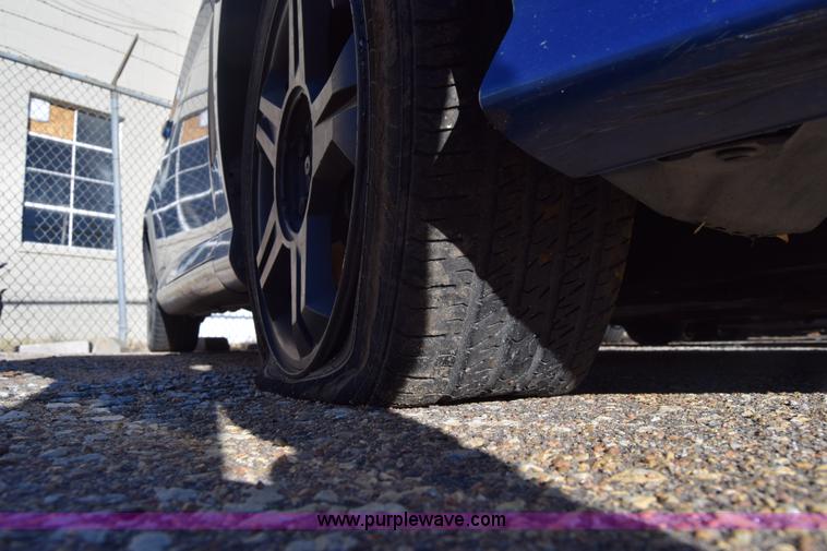 image for item L1017 2004 Hyundai Tiburon SUV