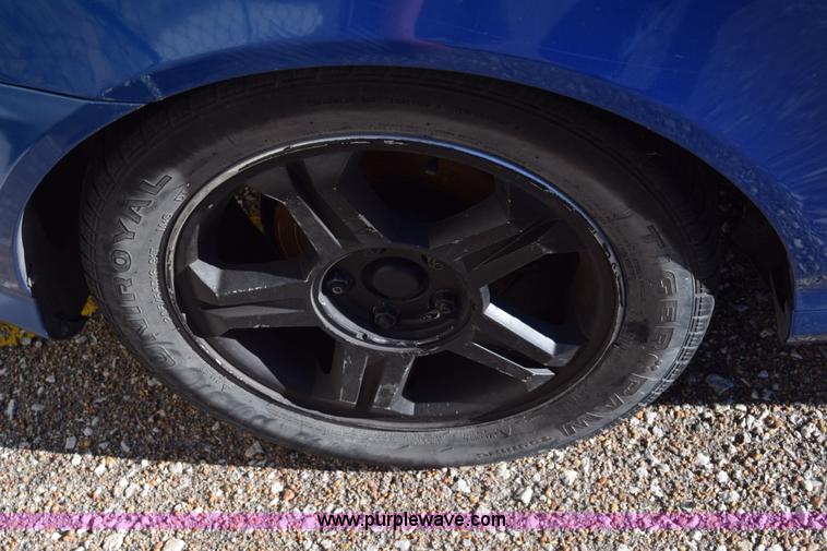 image for item L1017 2004 Hyundai Tiburon SUV