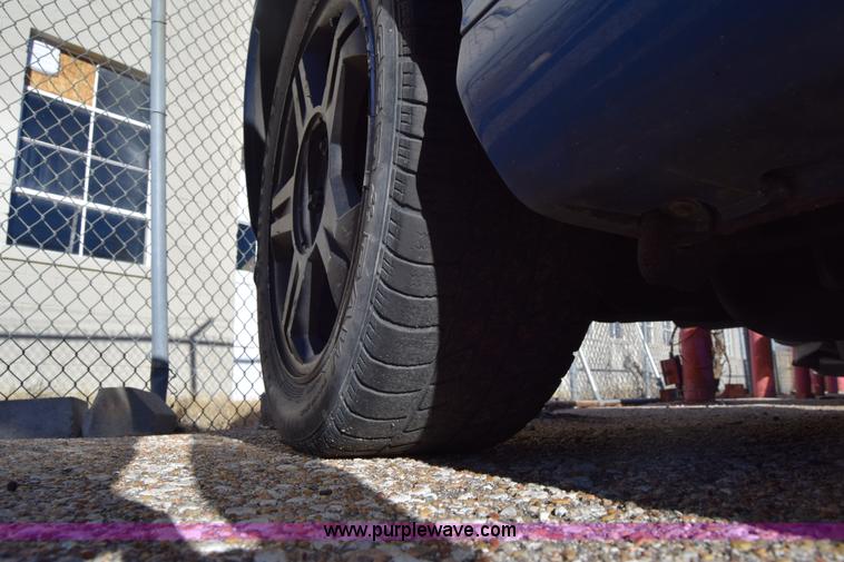 image for item L1017 2004 Hyundai Tiburon SUV