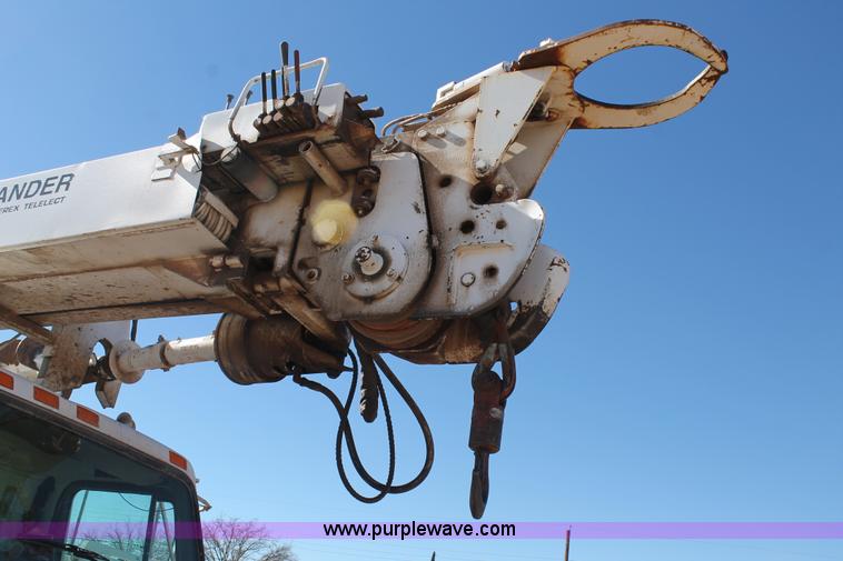 image for item J1311 2001 International 4900 digger derrick truck