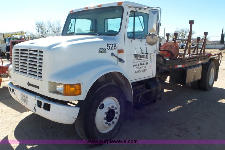 image for item J1335 1998 International 4700 flatbed truck