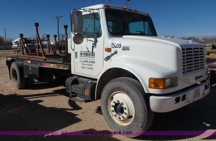 image for item J1335 1998 International 4700 flatbed truck