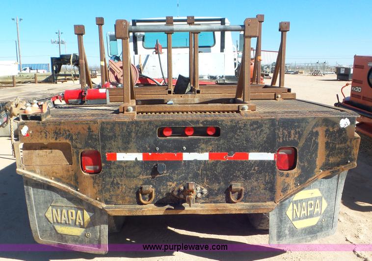 image for item J1335 1998 International 4700 flatbed truck