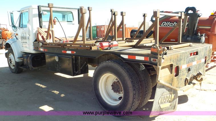 image for item J1335 1998 International 4700 flatbed truck
